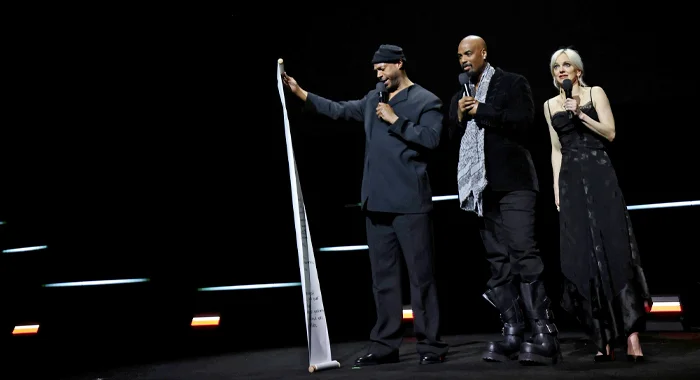 Marlon Wayans, Shawn Wayans, and Anna Faris on stage at CinemaCon 2026 to promote Scary Movie (2026)